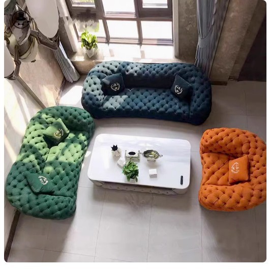 意式轻奢圆弧异形拉扣真皮沙发