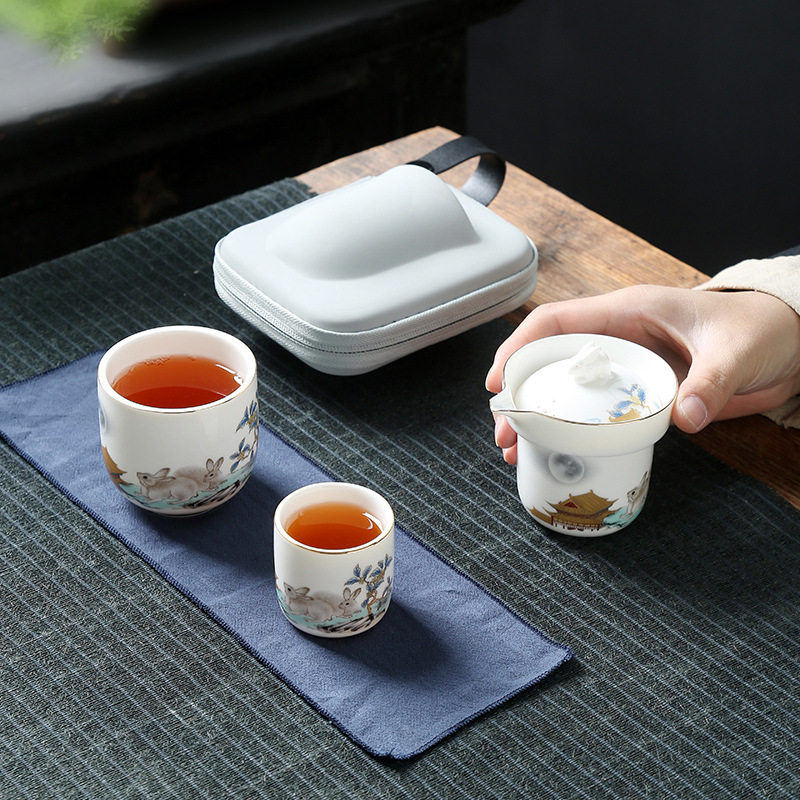 档羊脂玉陶瓷旅行茶具套装收纳包便携式玉兔呈祥快客杯一壶二杯