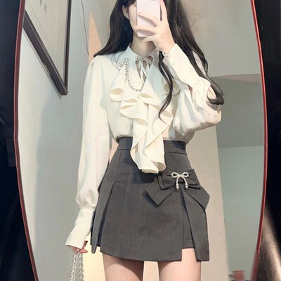 速发法式甜美荷叶边早春季小众设计感性感镂衬空袖长衣上衣