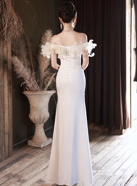 一字肩晚礼服2024新款欧美端轻奢连衣裙亮片鱼尾主持人白色礼服明
