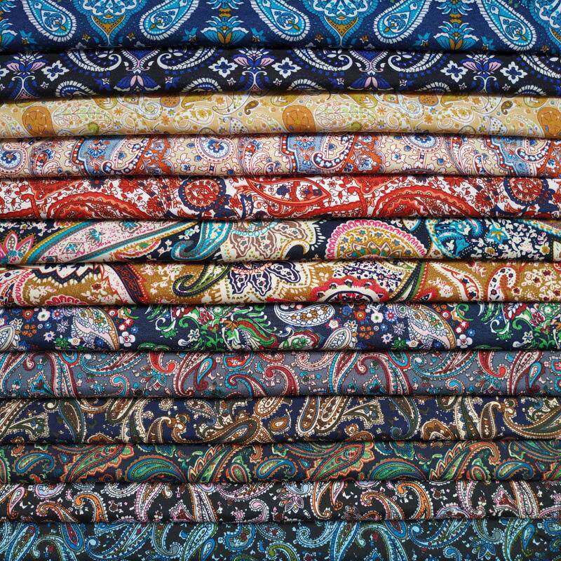 涤纶平纹腰果印花 帽子箱包里布沙滩裤面料 平纹桃皮绒印花布料