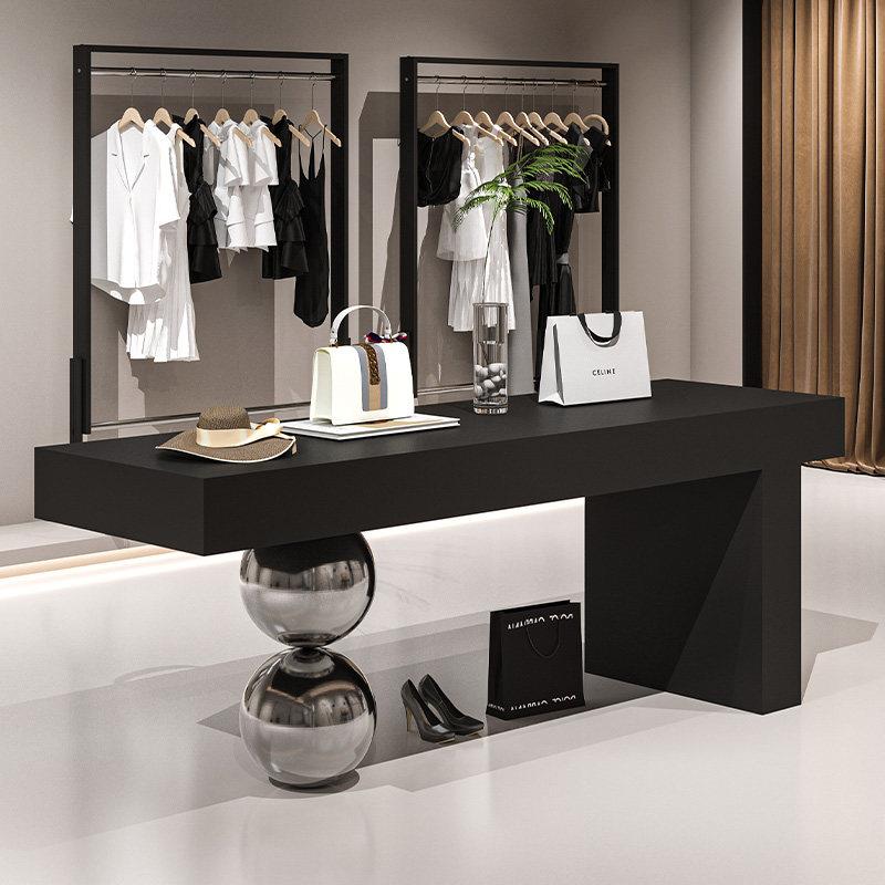 女装店中岛展示台流水台产品陈列桌黑色烤漆服装店铺展示桌展示柜