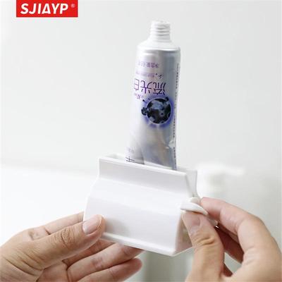 日本创意牙膏挤压器卫生间手动挤牙膏夹子挤牙膏神器牙膏架置物架
