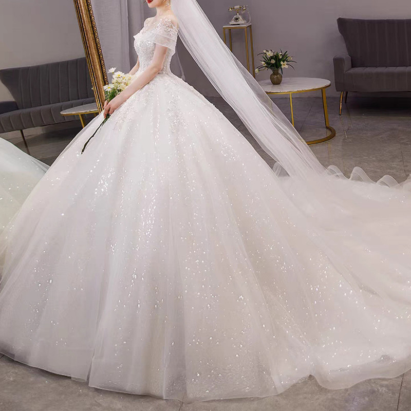 主婚纱2021新款新娘大拖尾奢华一字肩气质遮粗手臂孕妇法式小个子