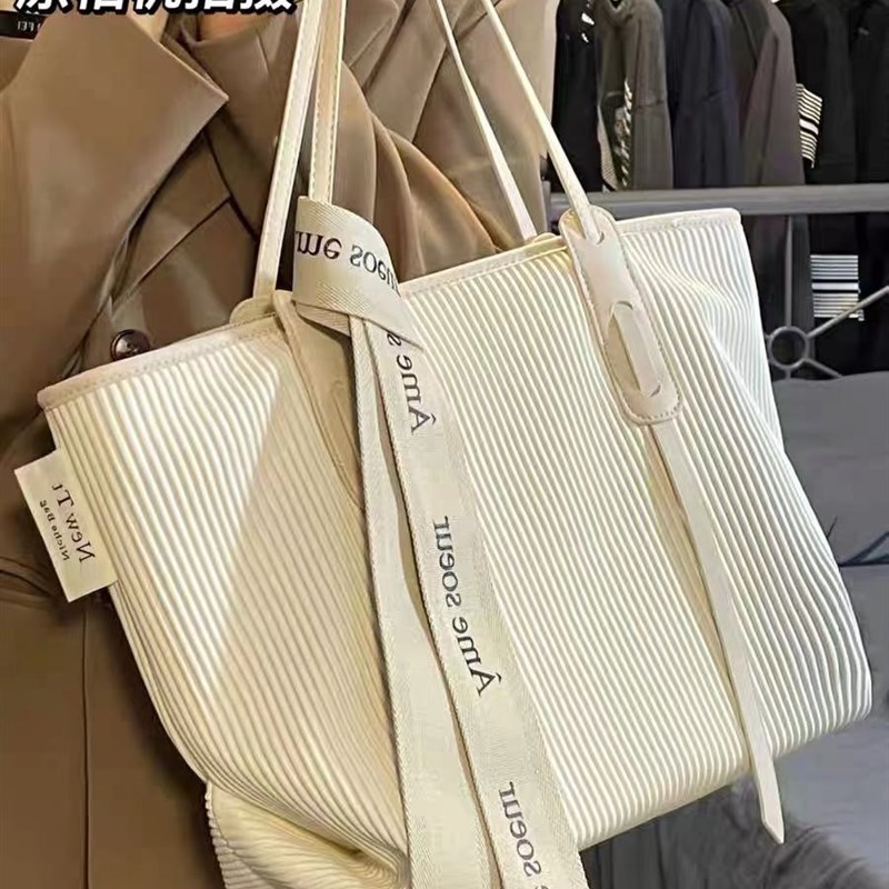 时尚百搭大容量单肩包2023新款上课包蛋糕包软皮通勤单肩托特包女