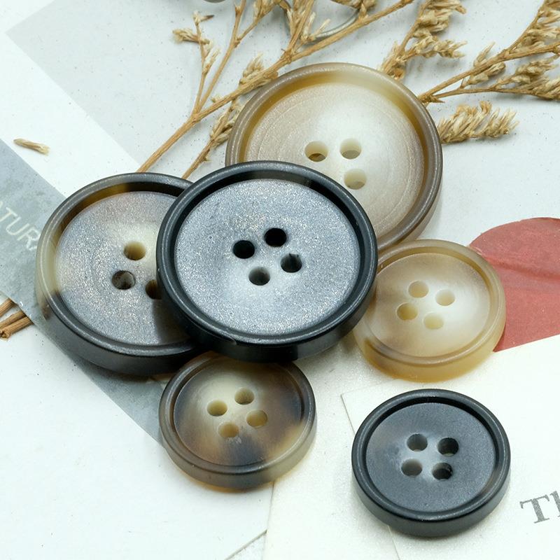 直销新款现货树脂纽扣黑咖花纹四眼毛呢大风衣钮扣圆形风衣西装扣