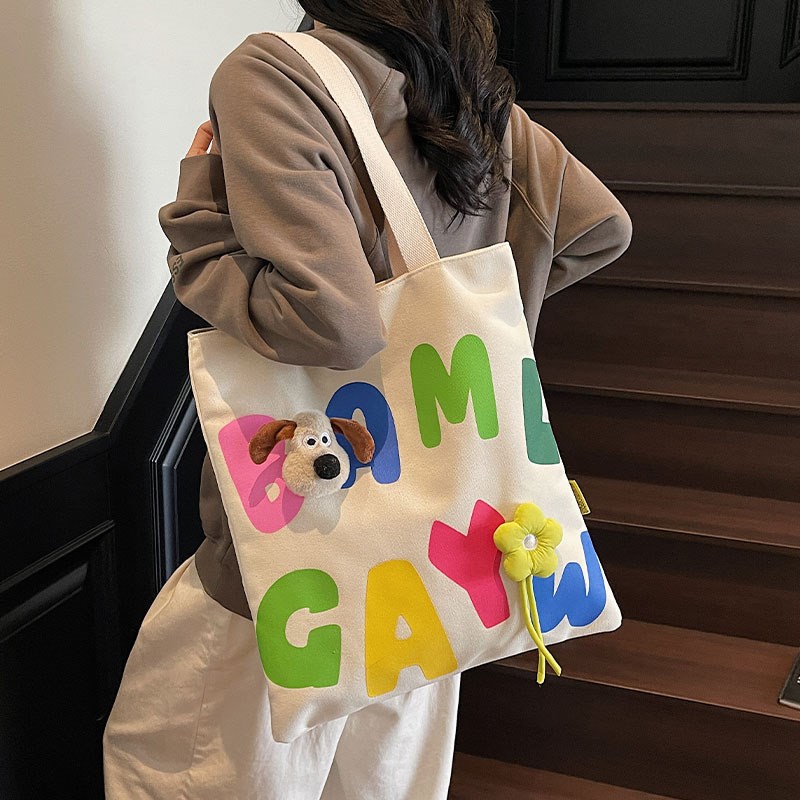 字母帆布包女大容量2025夏新款时尚小众手提袋学生装书单肩托特包