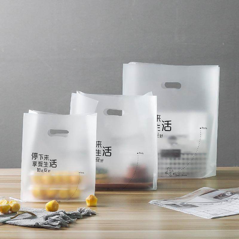 直销新款塑料袋手提袋简约网红蛋糕盒子便当通用服饰袋子烘焙一次