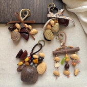 森系天然植物果壳摇铃包挂件印尼黑果夹竹桃种籽音愈闺蜜车挂礼物