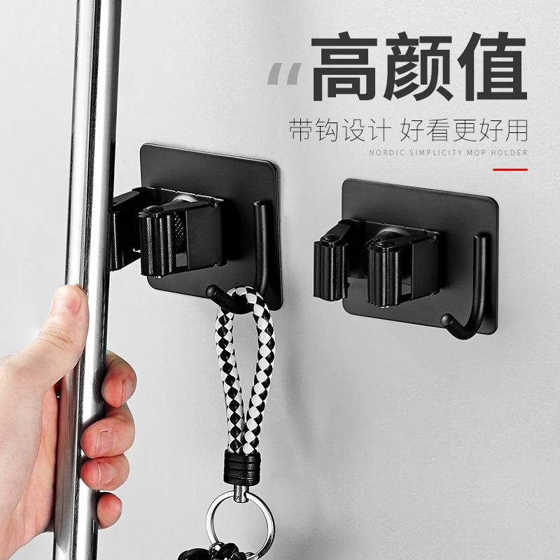 新款直销拖把挂钩免打孔家用老式拖把夹子酒店拖布扫把粘勾壁挂收