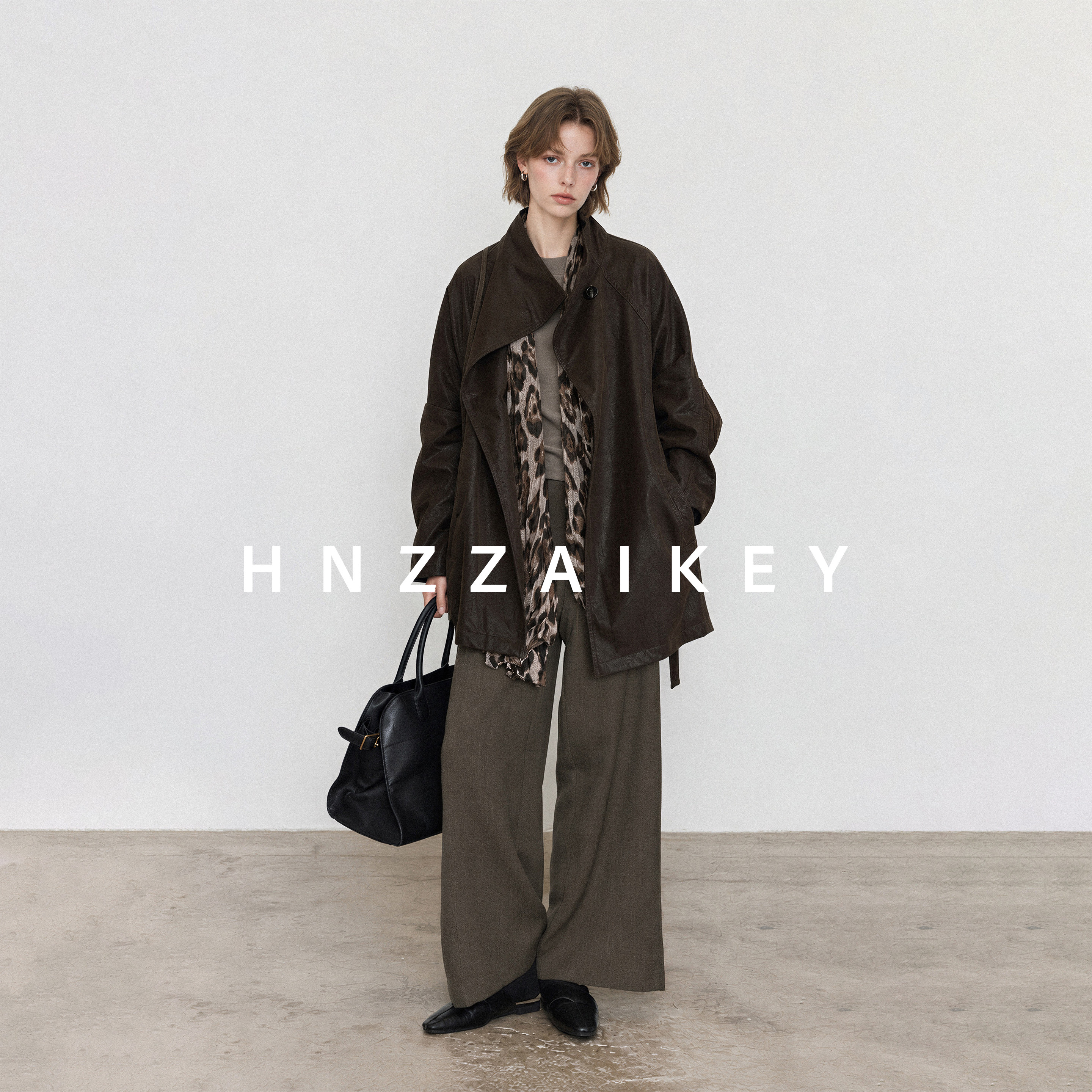 HNZZAIKEY/立领系带PU皮衣秋季新款高智感中长款风衣外套EC3979