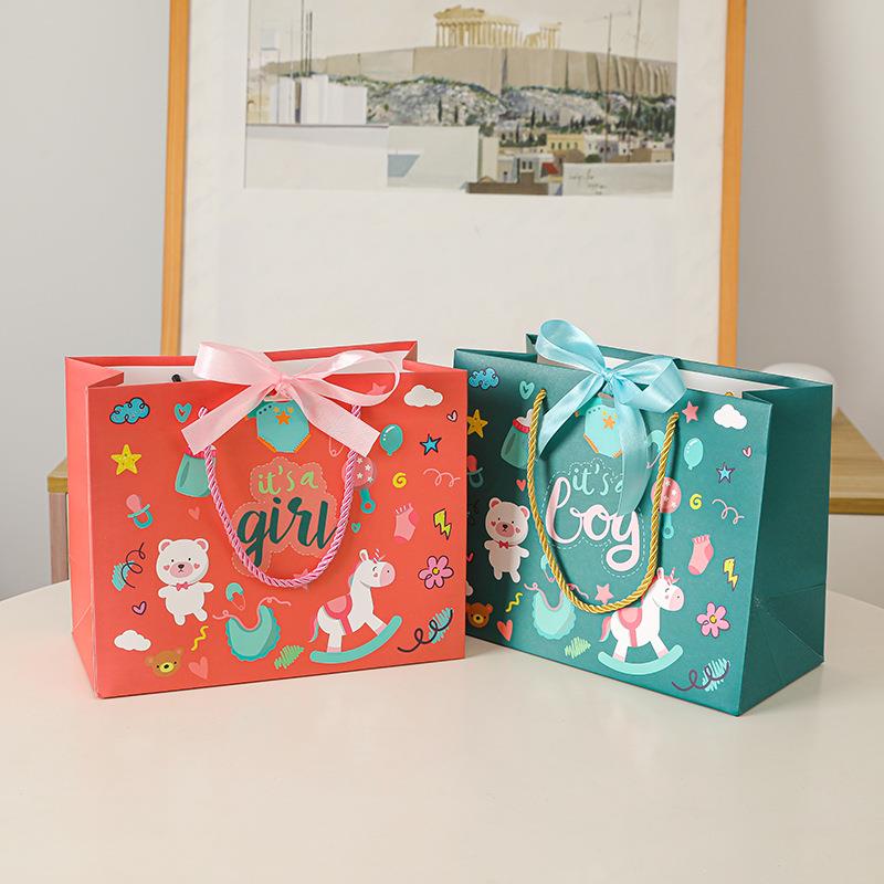 直销新款六一儿童节学校幼儿园创意礼品袋生日服装手提纸纸质礼物