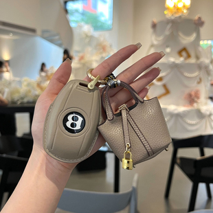 适用宾利钥匙套手工定制飞驰添越欧陆GT慕尚高档皮扣包壳汽车女