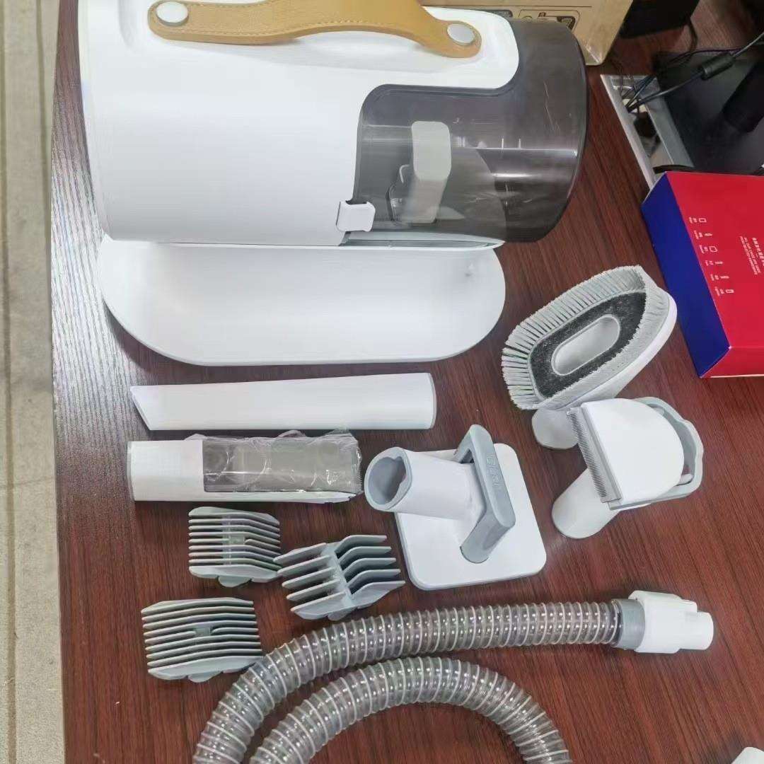 跨器境新款物宠理毛器多能吸尘电动猫刷毛沾毛吸毛功器家用PG100