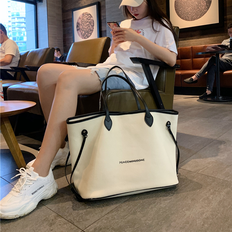 大包包2021新款潮大容量帆布休闲包小众设计帆布包女单肩大包女包