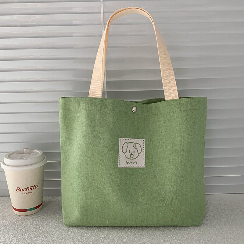 上班族小拎袋高级感帆布包女2026年新款加大容量简约布袋族通勤包