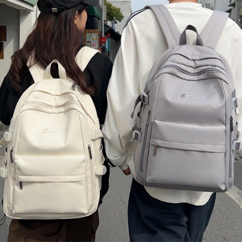 大容量简约休闲旅行双肩包男结实耐用15.6寸电脑背包大学生书包女