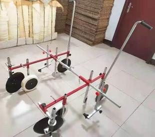 覆膜机 人力手拉盖膜机高低垄都可使用宽窄可调 农用种蒜铺地膜机