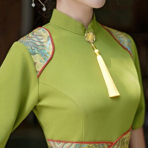 千百思新款走秀气质高端中国风鱼尾旗袍连衣裙复古主持演出服绿色