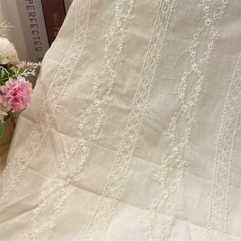 新款全棉镂空绣花布白色米色棉布双边刺绣服装连衣裙蕾丝绣花面料