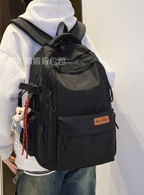 高中生书包2024新款男生潮流黑色双肩包女旅游轻便大容量电脑背包