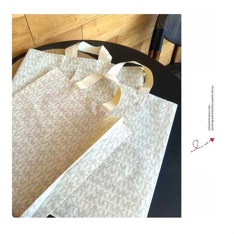 加厚塑料袋服装店高档购物袋春夏手拎胶袋大中小鞋盒化妆品包装袋