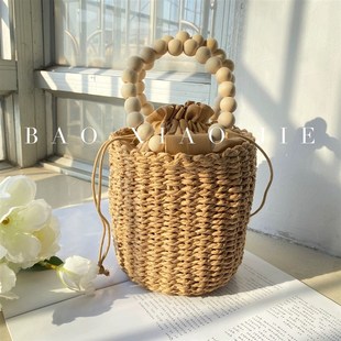 小清新串珠手提草编包手工编织包抽袋圆形海边沙滩提手水桶圆筒包