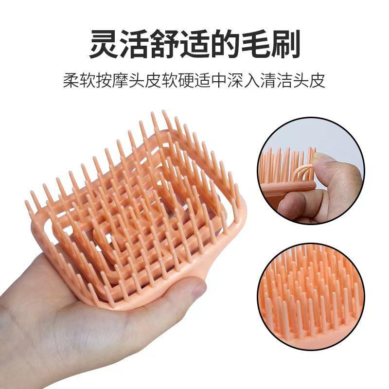 直销新款按摩梳子柔软高弹性回弹镂空贴合头皮手挽洗头刷洗澡不变