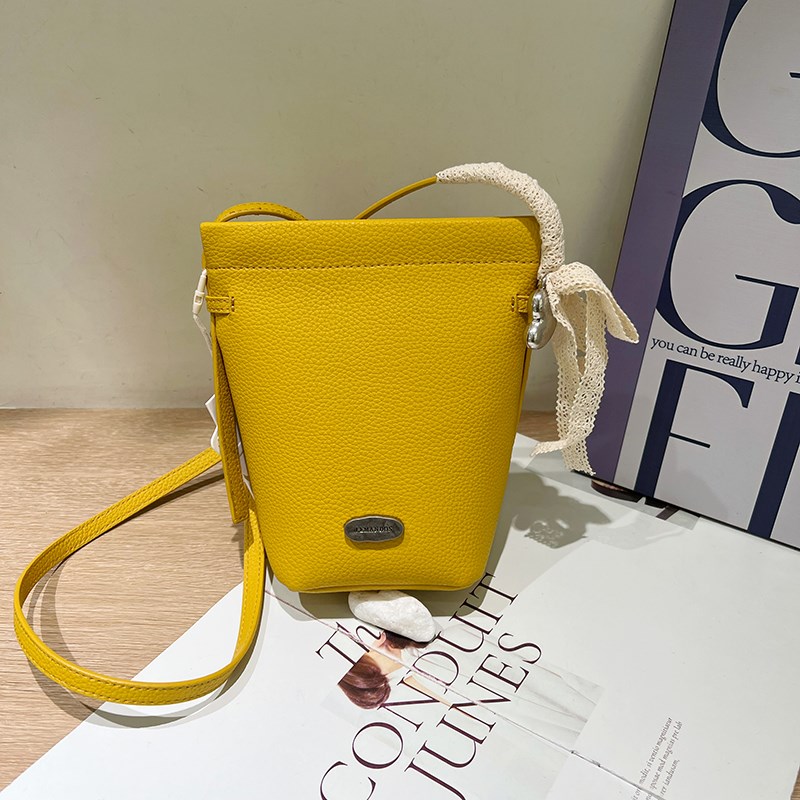 莱曼多斯时尚糖果色小水桶包荔枝纹手机包女包2025新款百搭斜挎包