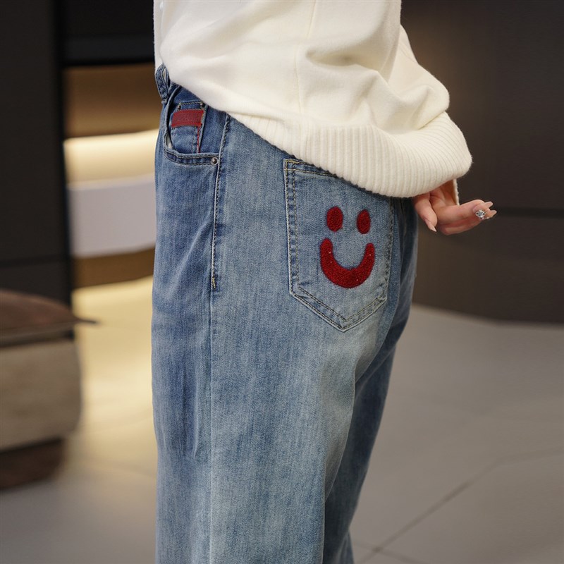 胖mm新款后笑脸口袋早春哈伦牛仔裤韩版大码女装高腰显瘦直筒女裤