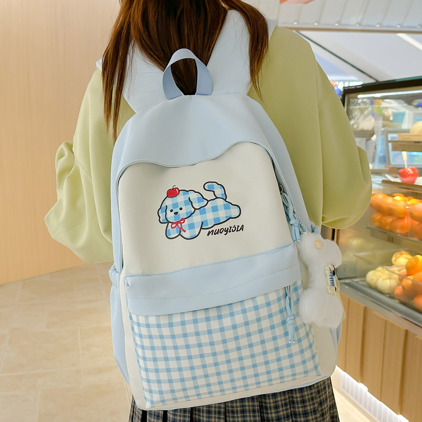 卡通格子书包女生小学生可爱双肩包大容量高颜值初中学生旅行背包