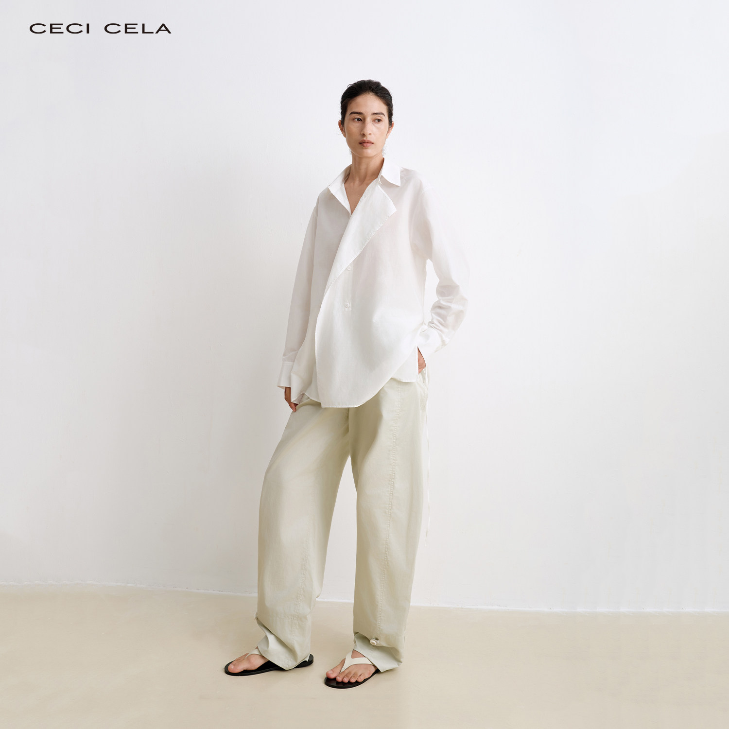 CECI CELA前后2穿设计感不对称polo荡领门襟经典白色丝棉长袖衬衫