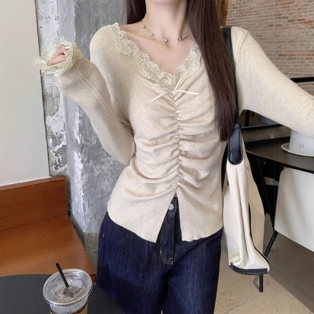 奥特莱斯折扣店撤柜清仓纯欲风黄色蕾丝v领长袖针织衫女秋冬修身