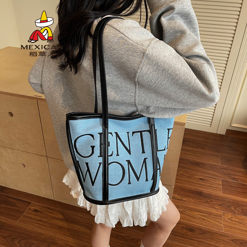 稻草人帆布包包女2025新款大容量刺绣单肩包休闲百搭字母托特包