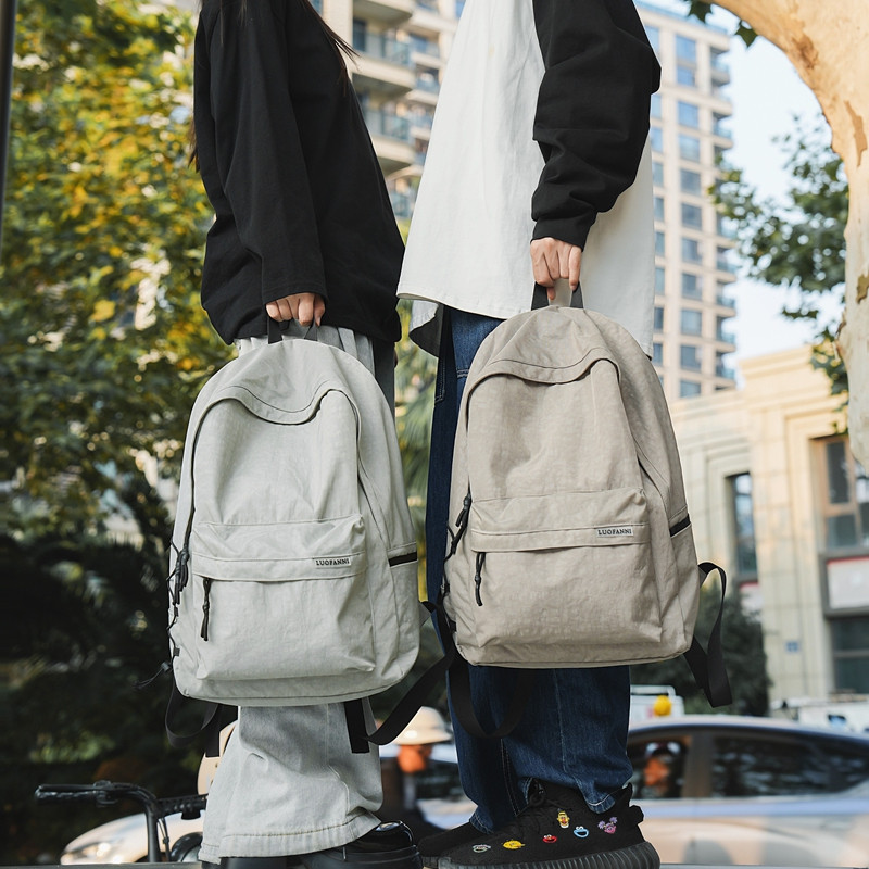 稻草人双肩包大容量休闲简约背包女男初中生高中大学生防水书包