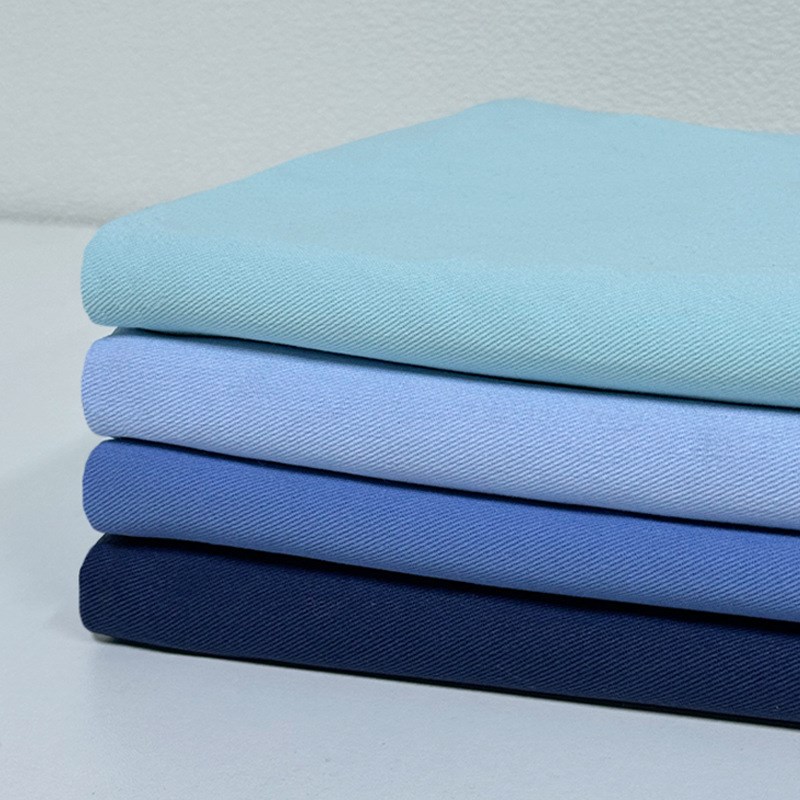 现货全棉21*21洗水棉斜纹纱卡水洗棉布料鞋帽童装服装工装面料