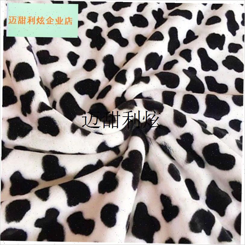 奶牛豹纹布料空调毯法r兰绒毛毯法兰绒牛奶绒床单面料珊瑚绒睡衣,