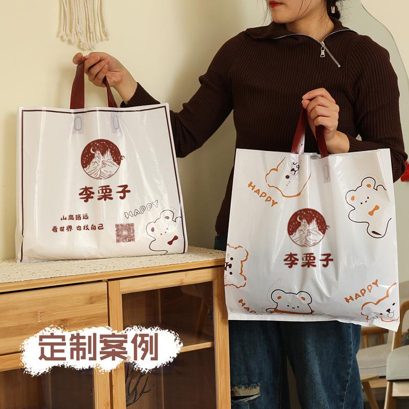 新款直销服装手提袋商场购物红色包装袋卡通印花童装伴手礼袋子塑