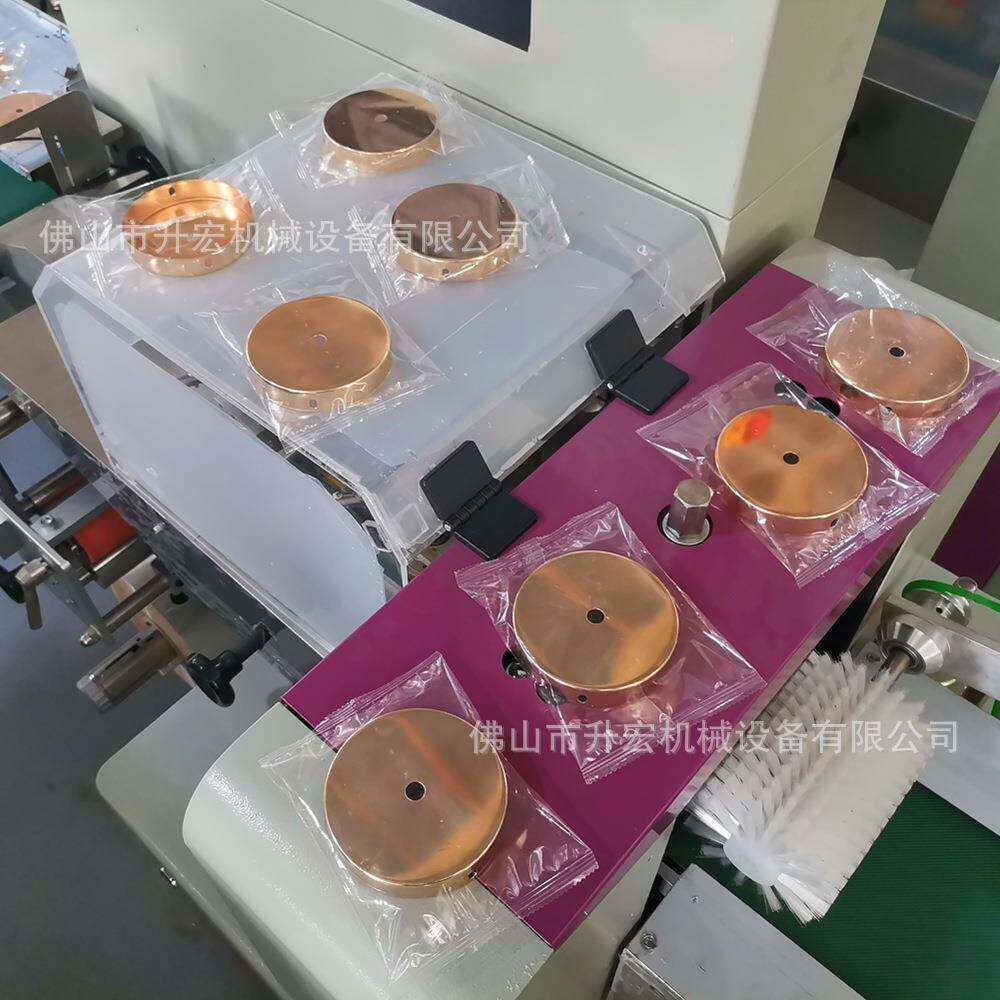 厂家供应灯饰灯具五金配件包装机铜制枕式多功能打包机