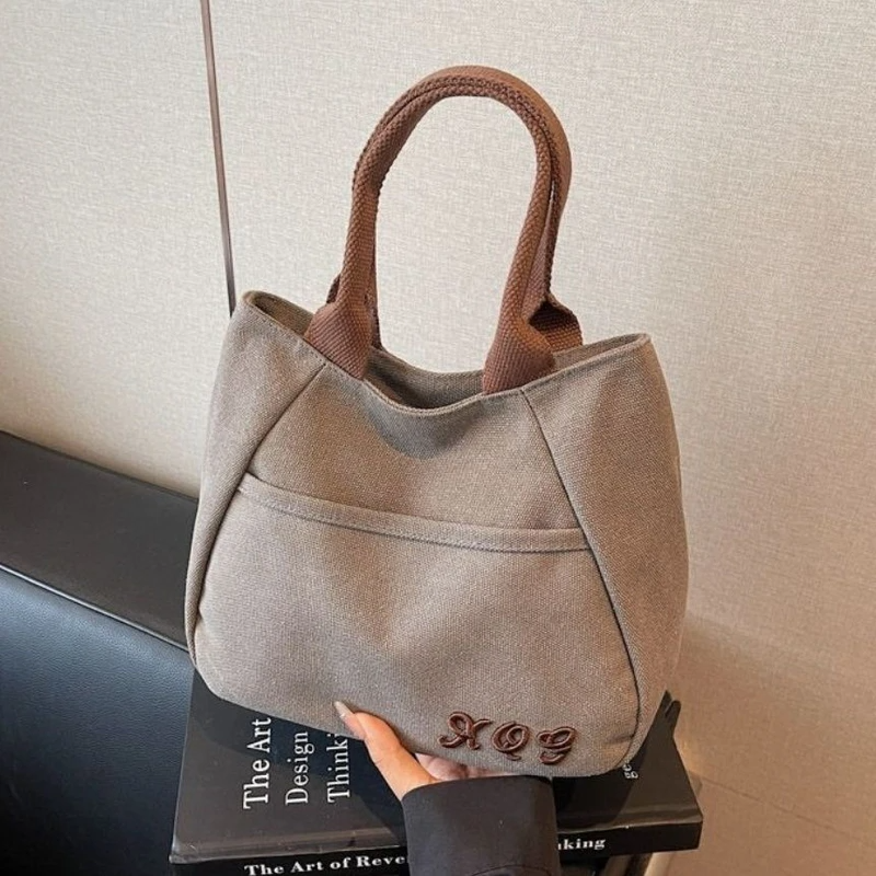 小众帆布包女出门上班小拎包通勤托特包新款日常百搭饭盒手提包
