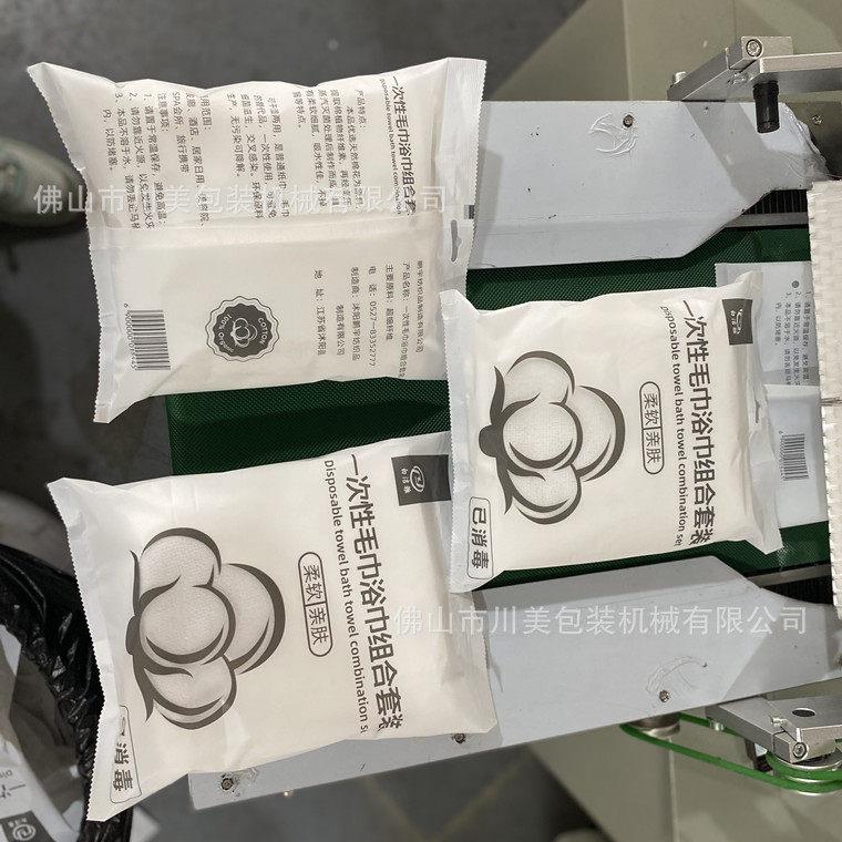 一次毛巾包装机湿巾巾700抽真空自动套机压缩浴全自性动枕式包装