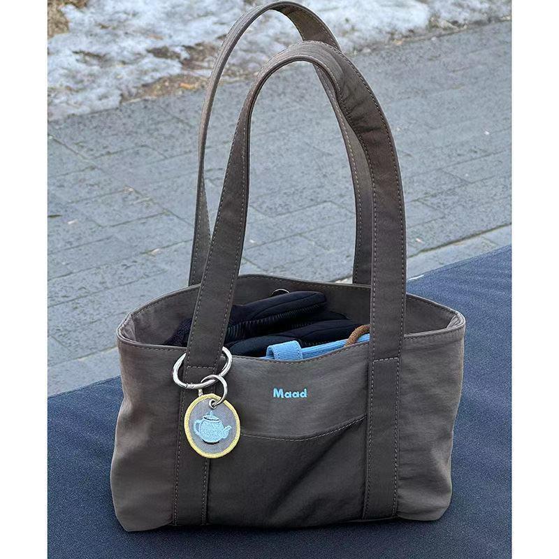 时尚小众通勤托特包单肩大容量尼