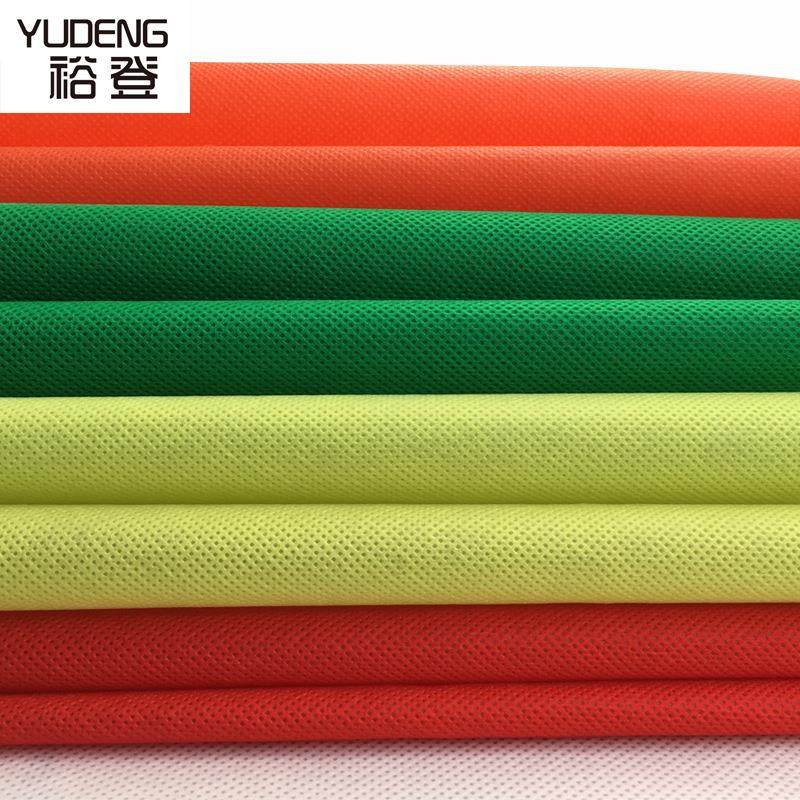 现货彩色纺粘无纺布 环保手袋用布料防水pp彩色纺粘无纺布