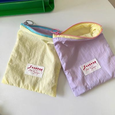 马卡龙收纳外出便携简约小包撞色多巴胺薄款化妆包零钱口红收纳袋