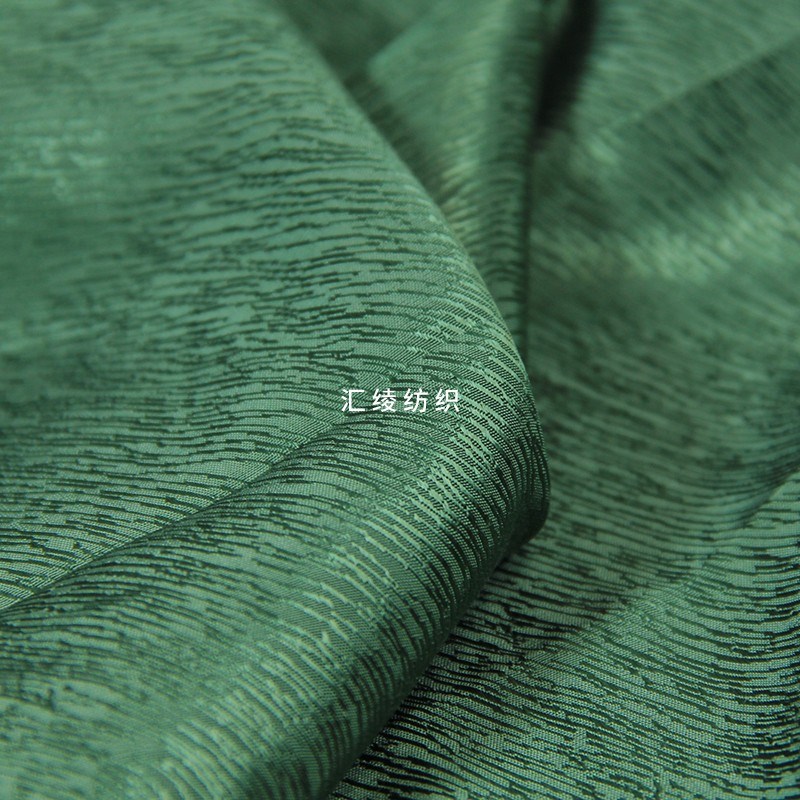 提花重磅铜氨丝布料墨绿色垂感亮面连衣裙衬衫旗袍服装设计面料