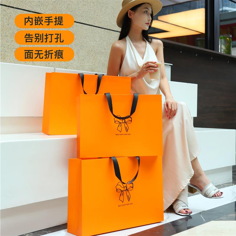 高级服装店手提袋纸袋购物女装衣服美容院包装带定制礼品打包袋子