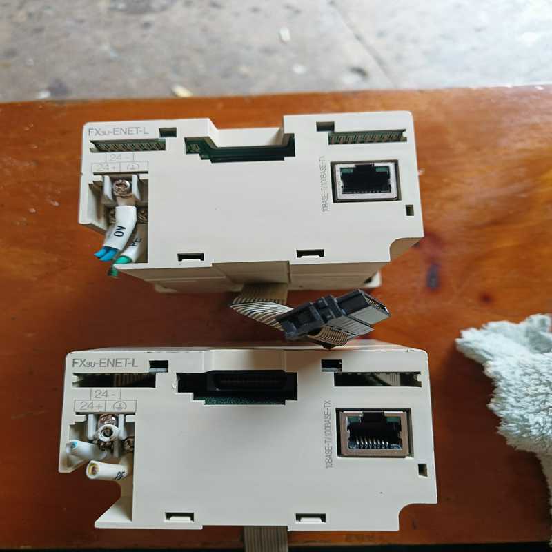询价~三菱FX3U-ENET-L，实物图，无盖子。