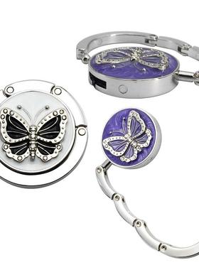 带珠蝴蝶挂包钩黑白金属折叠挂包扣挂钩锌合金属圆形桌边钩厂家