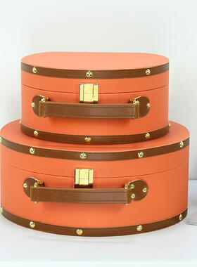 样板房家居软装橙色半圆手提箱摆件装饰品盒子收纳箱新中式简约