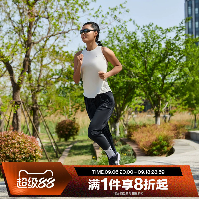 滔搏NIKE耐克女子宽松跑步运动裤训练休闲梭织长裤FB7030-010